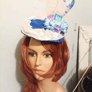Elegant Blue and White Fascinator with Floral Accent